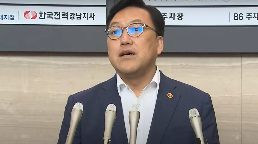 The Financial Services Commission Chairman Kim Byung-hwan speaking to reporters in 2024.