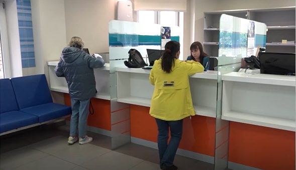 Citizens inside a branch of the Russian Federal Tax Service in the Moscow Oblast.
