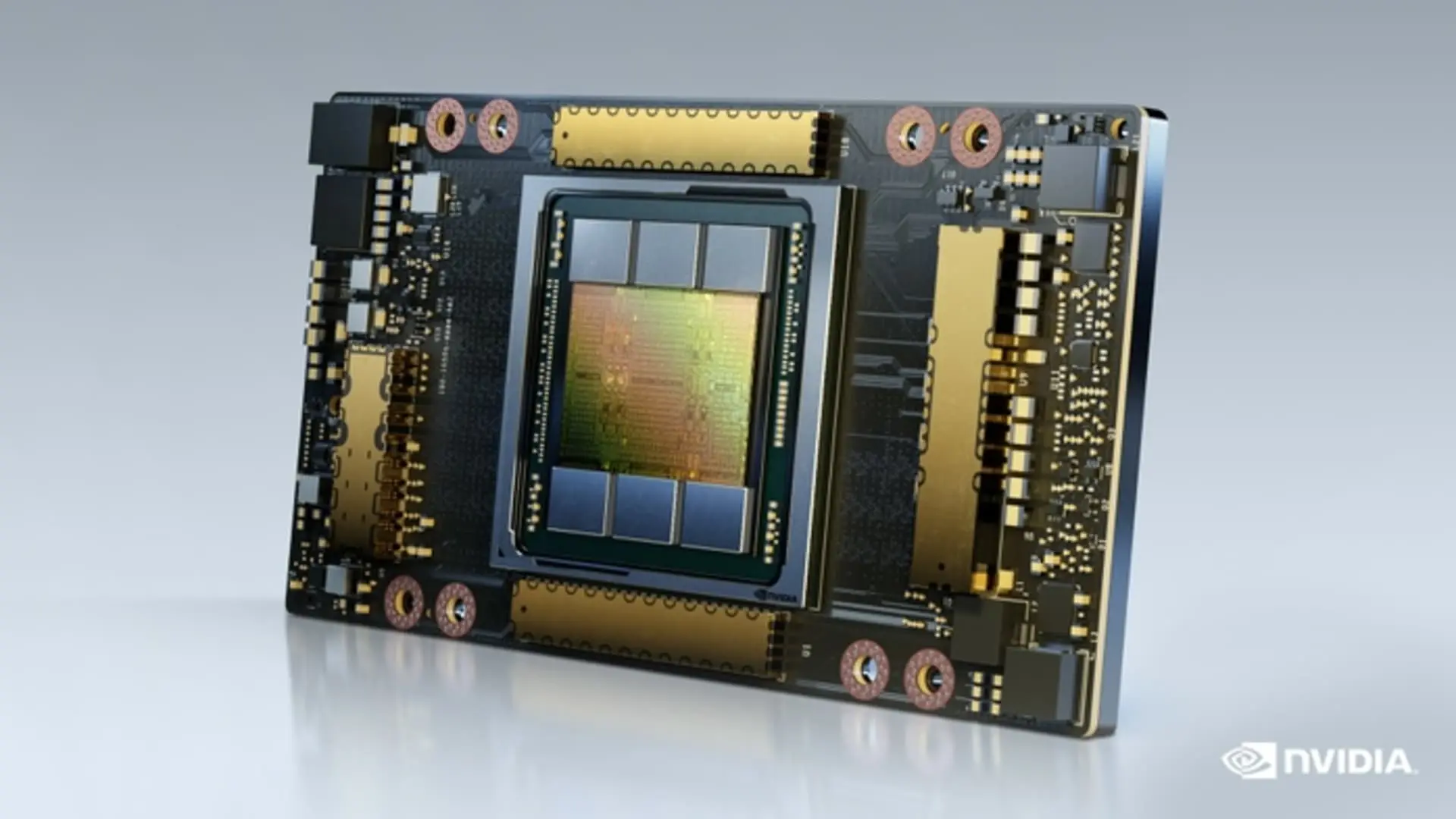 A high-angle studio shot of an Nvidia AI semiconductor chip and processor board on a white background.