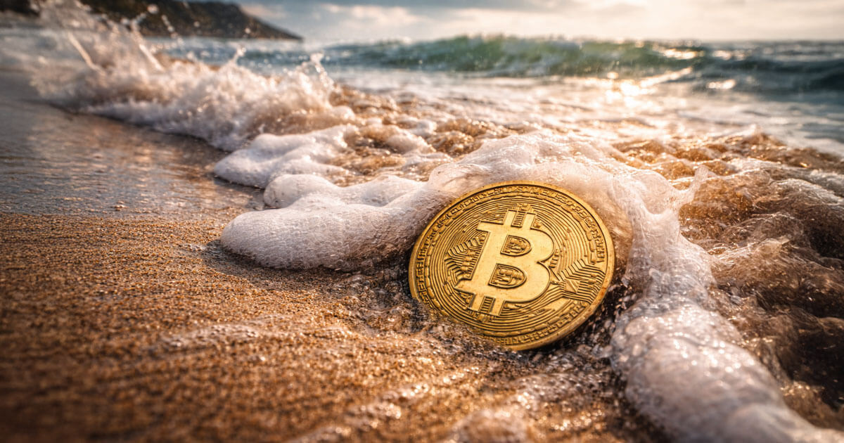 A Bitcoin coin sits in retreating ocean surf on a beach, symbolizing the market’s struggle to reclaim $90,000 as liquidity thins and overall depth continues to weaken.