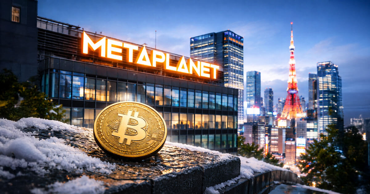 A Bitcoin coin sits on a snowy ledge overlooking Metaplanet’s Tokyo headquarters, highlighting the company’s stalled BTC purchases over the past three months.