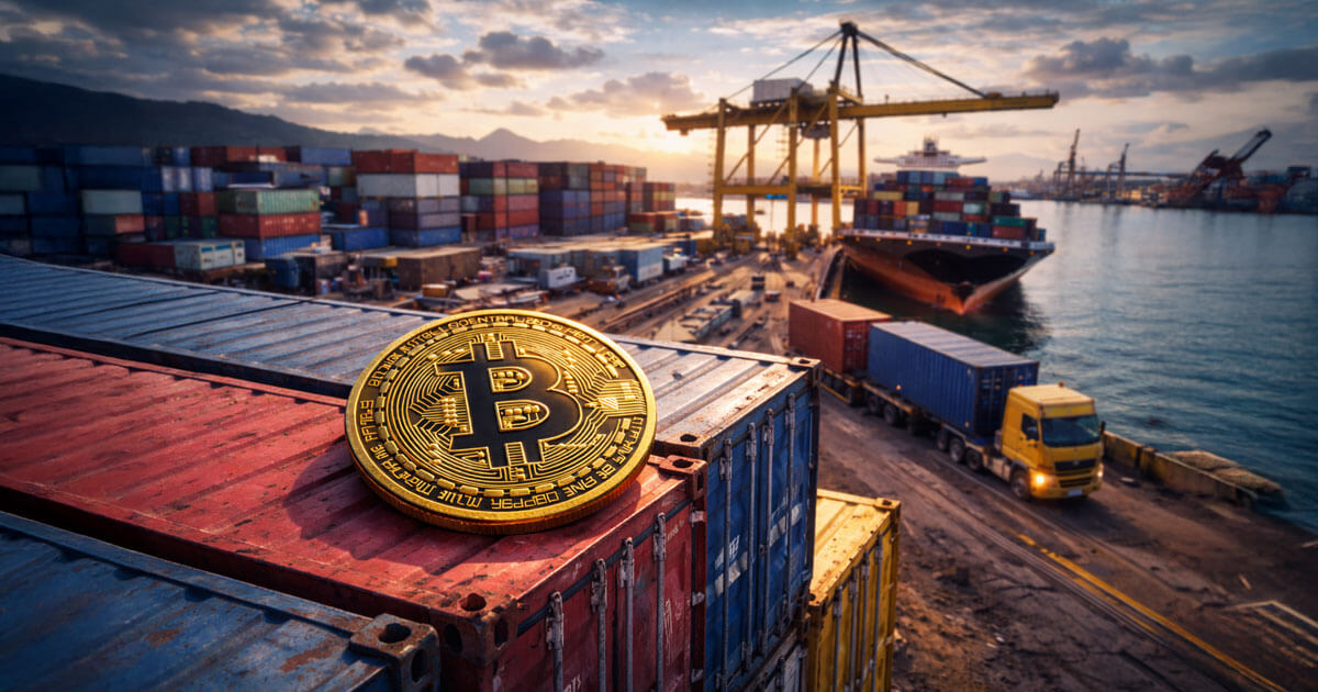 A large Bitcoin coin on stacked shipping containers at a busy port as cargo moves in the background, reflecting market tension ahead of Monday’s 2026 PMI release.