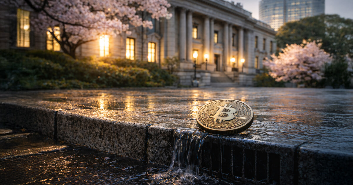 Bitcoin coin on a wet curb outside a government building at dusk, symbolizing how Bank of Japan rate hike wording could pressure Bitcoin prices