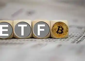 Picture of letter boxes with ETF written on them and a bitcoin at the end