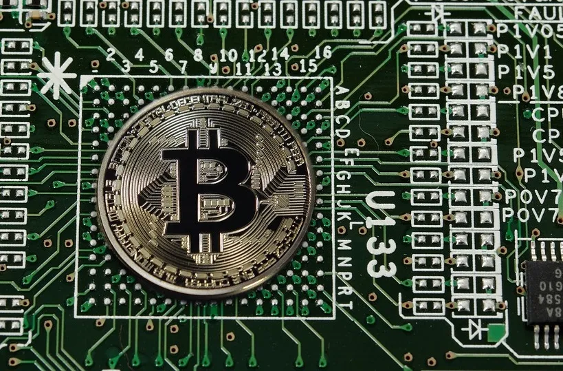 Intel, bitcoin logo in a chip